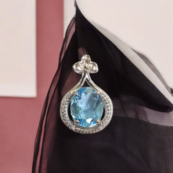 Eternal Flame Blue Topaz Pendant
